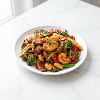 Wok charred stir fry vegetables protein glossy sauce wok hei sesame plate — stir fry hero photography