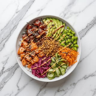 Asian fusion bowl rice protein edamame avocado pickled vegetables sesame overhead — fusion bowl hero photography
