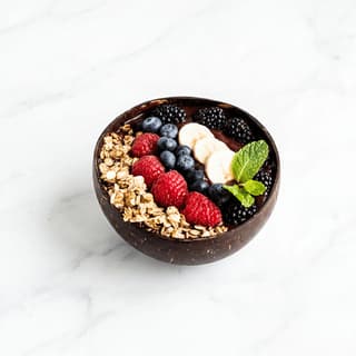 Acai smoothie bowl granola banana berries seeds — smoothie bowl hero photography