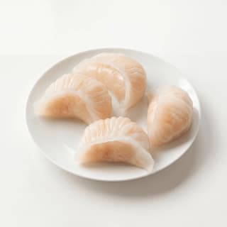Har gow translucent crystal skin shrimp dumplings pleated — Cantonese har gow hero photography
