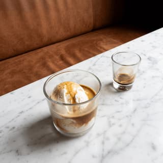Classic affogato vanilla ice cream espresso pour glass cup — Italian coffee dessert hero photography