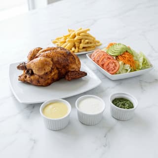 Pollo a la brasa quarter chicken aji verde Peruvian fries plate — pollo a la brasa hero photography