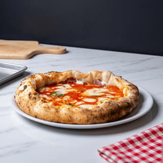 Neapolitan Montanara pizza with San Marzano tomato and buffalo mozzarella — pizzeria menu photography