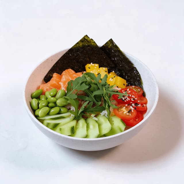 Salmon poke bowl on a seamless white set — bowl campaign food photography
