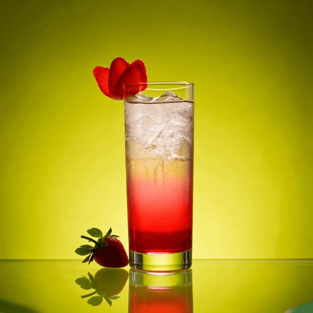 Strawberry soda highball on a chartreuse backdrop — drinks campaign food photography