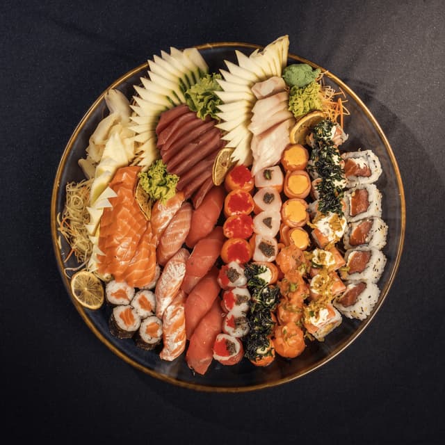 Sushi platter of nigiri, maki and sashimi from above — sushi restaurant client photography