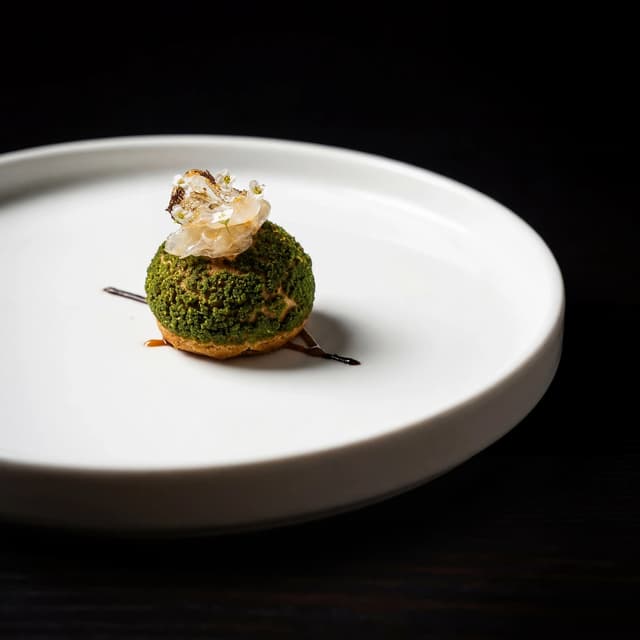 Fine dining plated dish with herbs