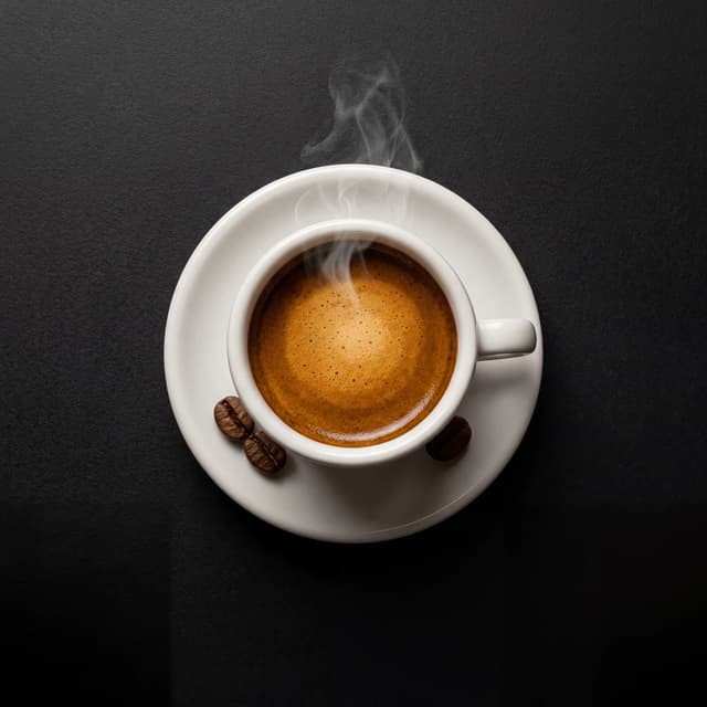Espresso shot close up crema golden amber three tone dark monolith — espresso close up card photography
