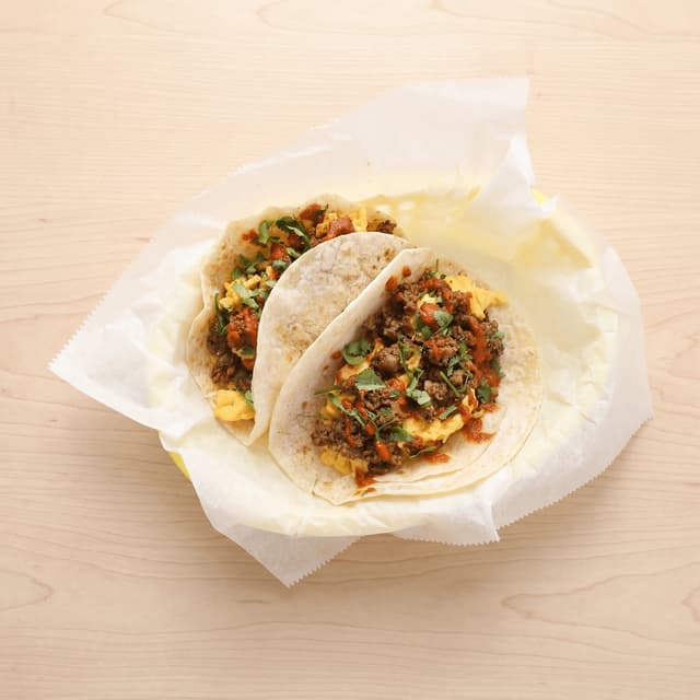 Dallas breakfast tacos eggs bacon potato cheese salsa flour tortilla overhead — breakfast taco hero photography