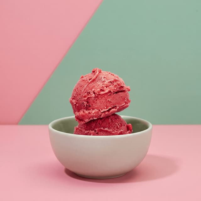 Tropical mango passion fruit and hibiscus paletas — frozen treat brand social media ad photography