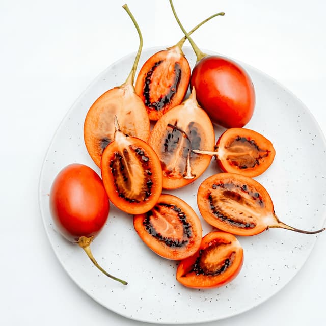 Native Australian finger lime and Kakadu plum ingredient showcase — bush food brand product photography