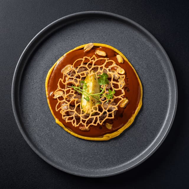 Mole madre and mole nuevo with hoja santa tortilla — Mexican campaign-grade food photography
