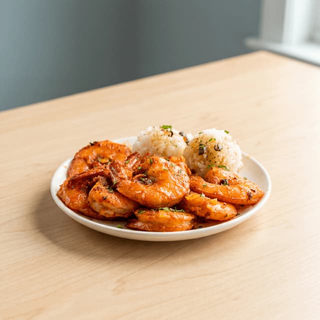 North Shore garlic shrimp plate rice butter garlic lemon — garlic shrimp hero photography