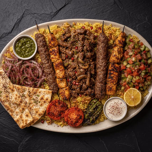 Jerusalem mixed grill skewers kebab chicken lamb overhead dark slate Israeli — Jerusalem grill card photography