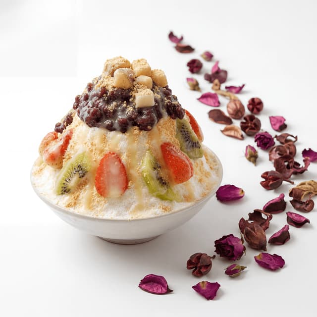 Patbingsu shaved ice red bean condensed milk fruit rice cake tall bowl Korean dessert — bingsu hero photography