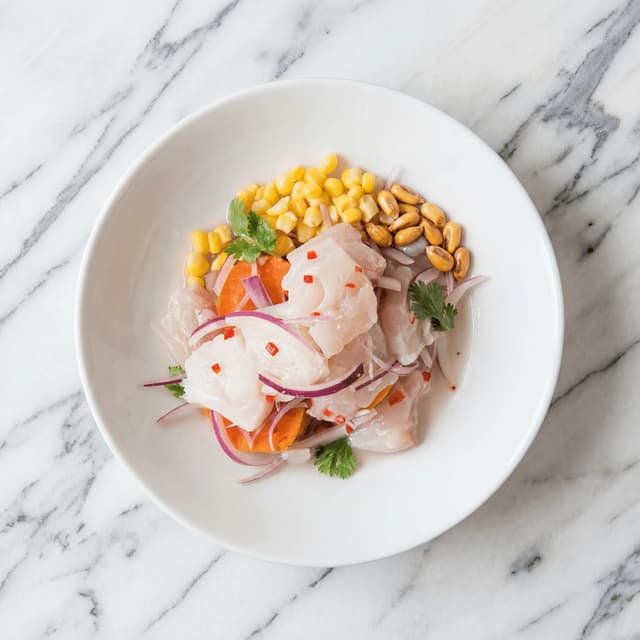 Classic ceviche clasico fish leche de tigre camote choclo overhead — Peruvian ceviche hero photography