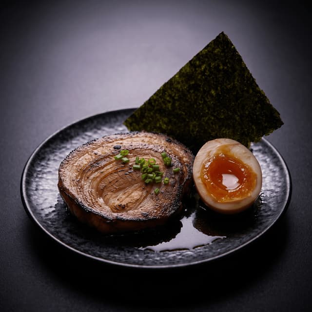 Chashu pork belly ajitama egg nori sheet topping macro Michelin — ramen topping macro card photography