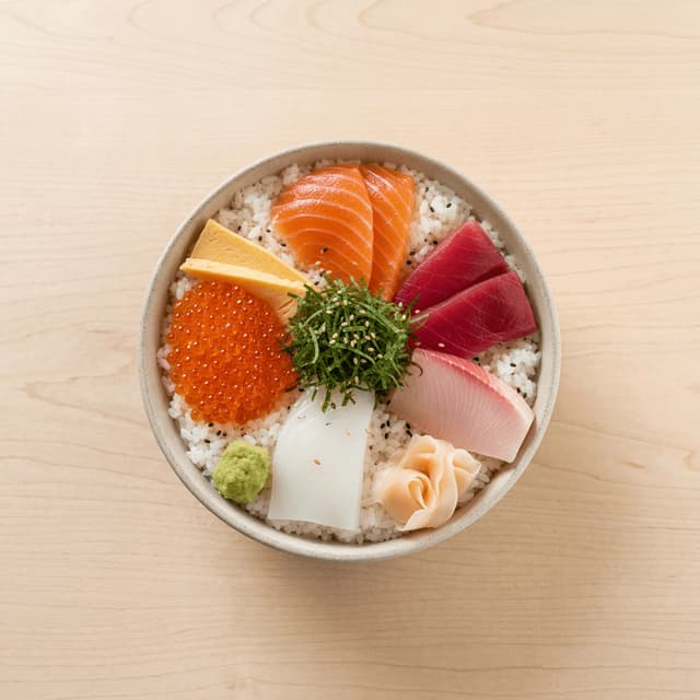 Chirashi donburi bowl assorted sashimi rice overhead — chirashi hero photography