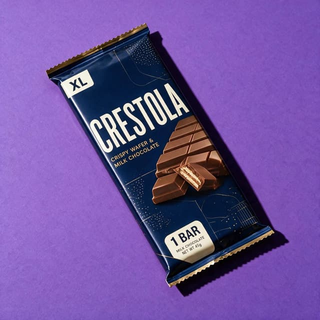 Chocolate bar wrapper on saturated purple poster backdrop with hard shadow — AI packaged food photography