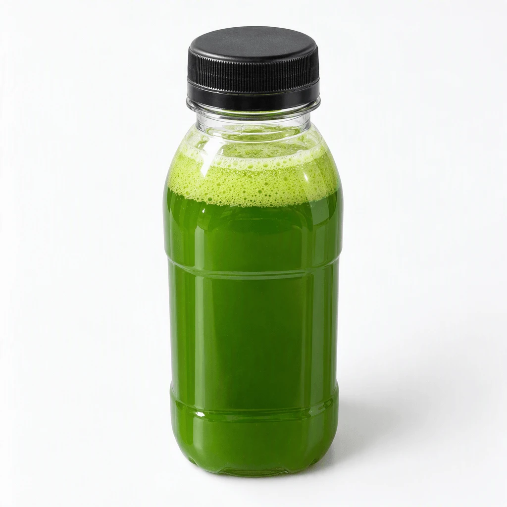 Single tall unlabelled clear plastic bottle of cold-pressed green juice with a plain black screw cap, standing on a seamless white studio background