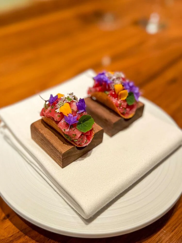 Original bar food photo — smartphone quality tuna tartare taco