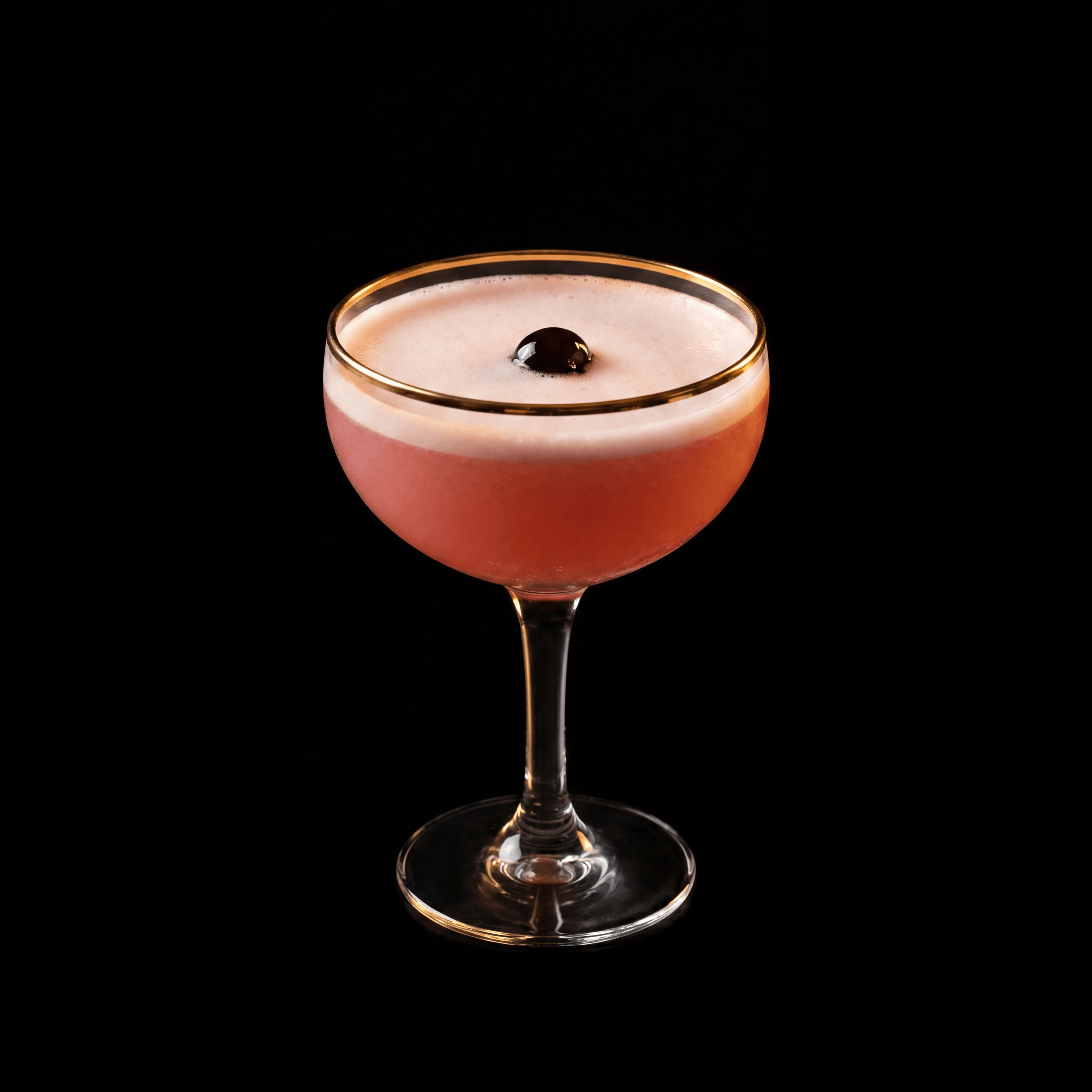 Pink Lady cocktail layered red gradient coupe glass — colored layered cocktail hero photography