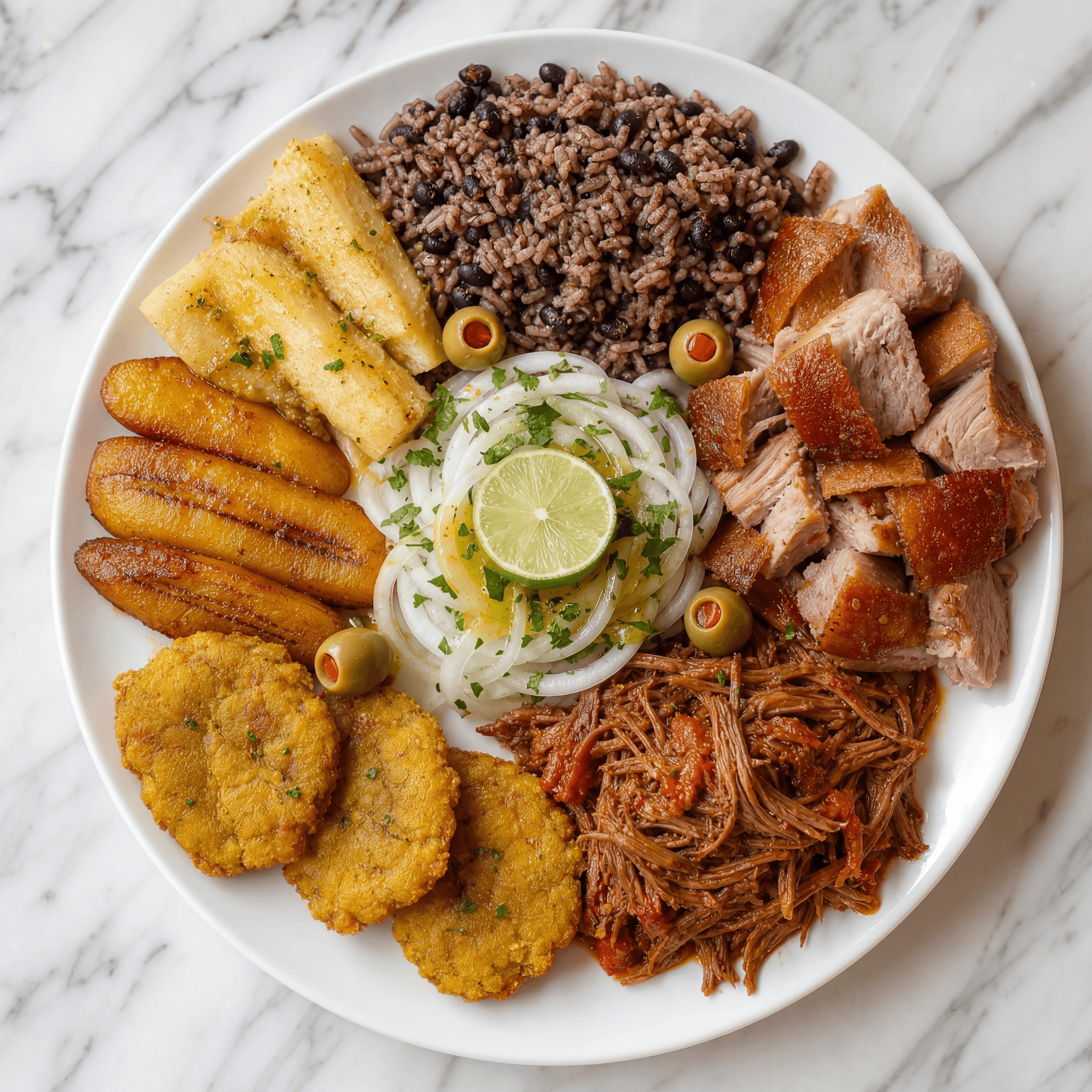 Cuban combo plate moros y cristianos rice beans roast pork yuca overhead marble — cuban plate hero photography