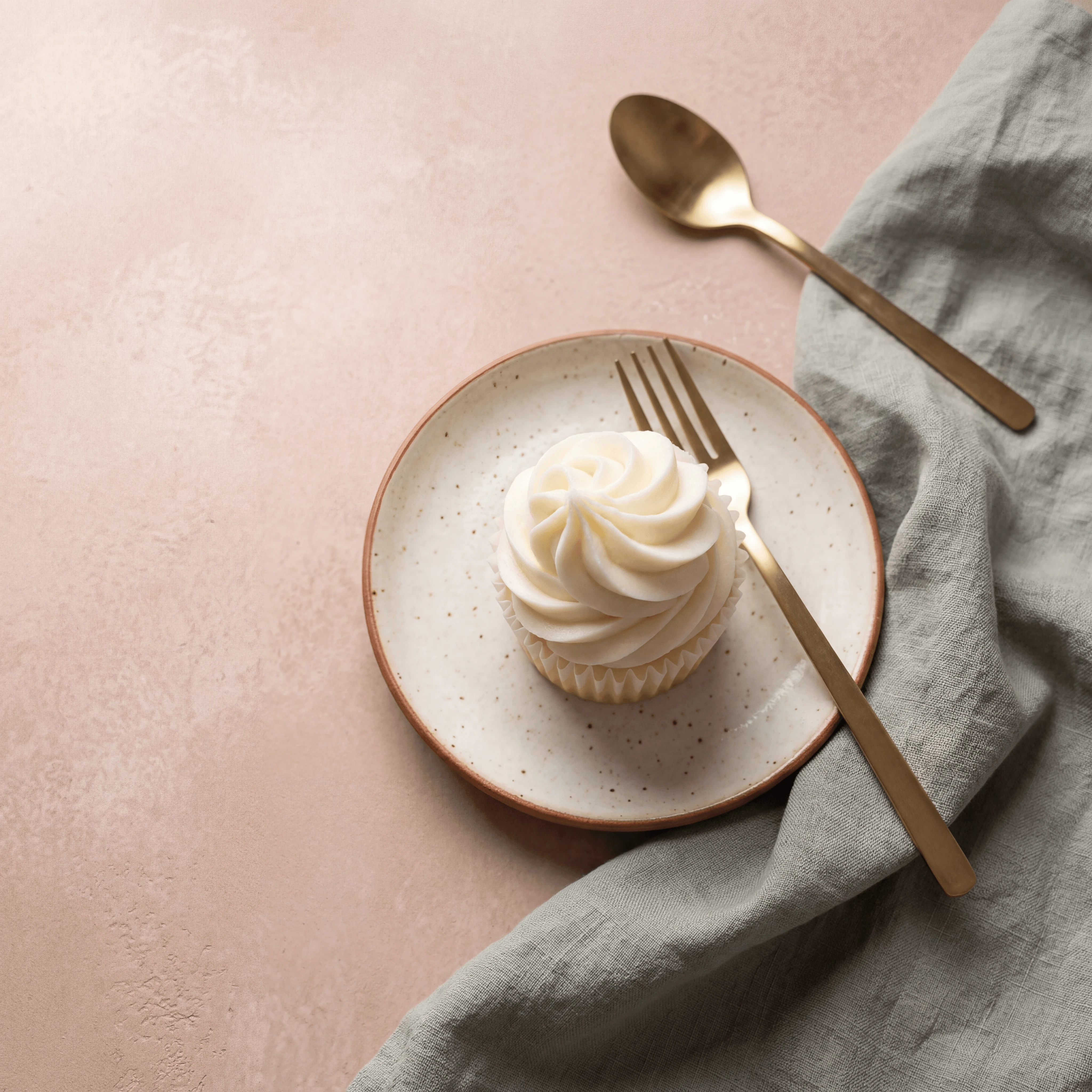 Tall vanilla buttercream rosette swirl close-up — frosting close-up cupcake photography
