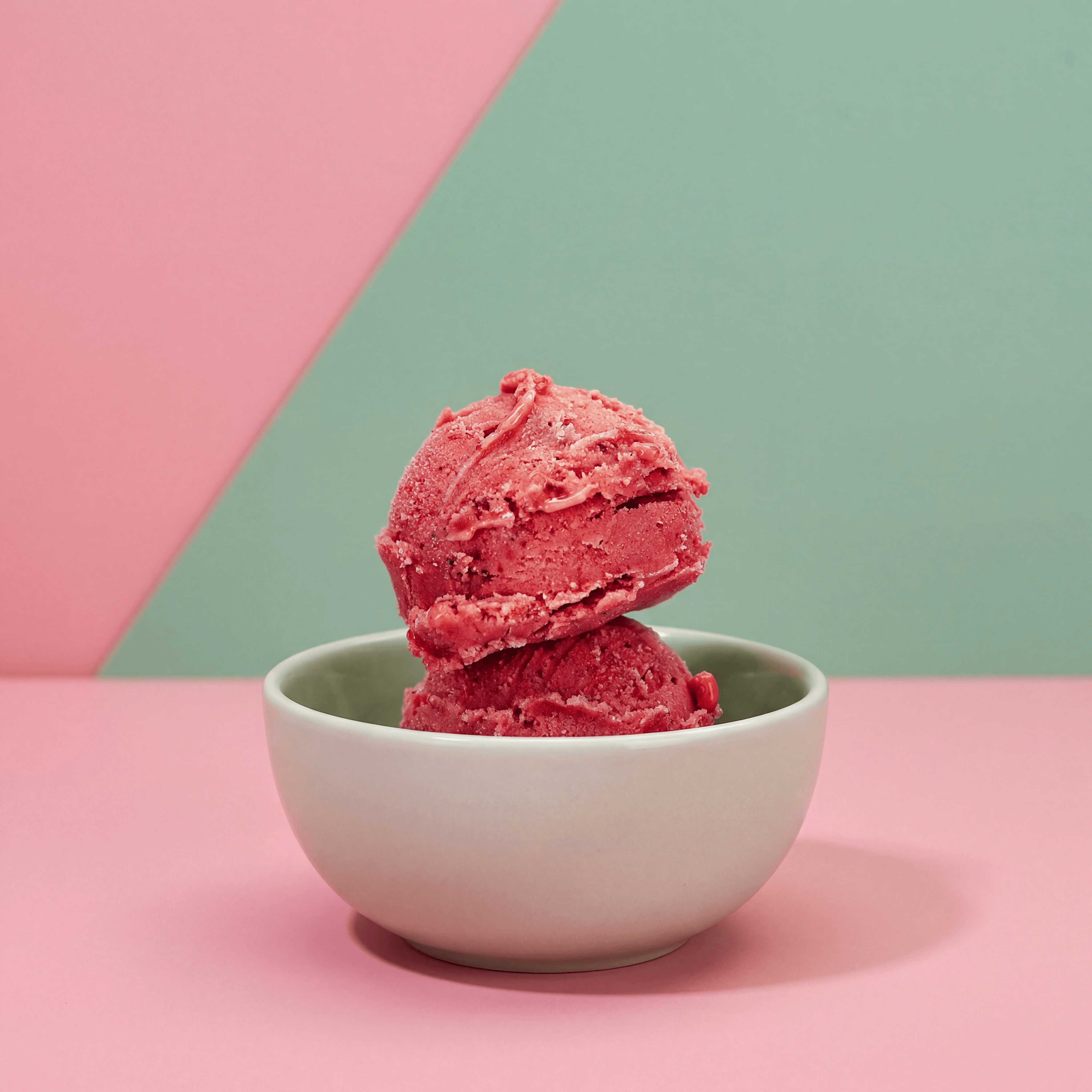 Tropical mango passion fruit and hibiscus paletas — frozen treat brand social media ad photography