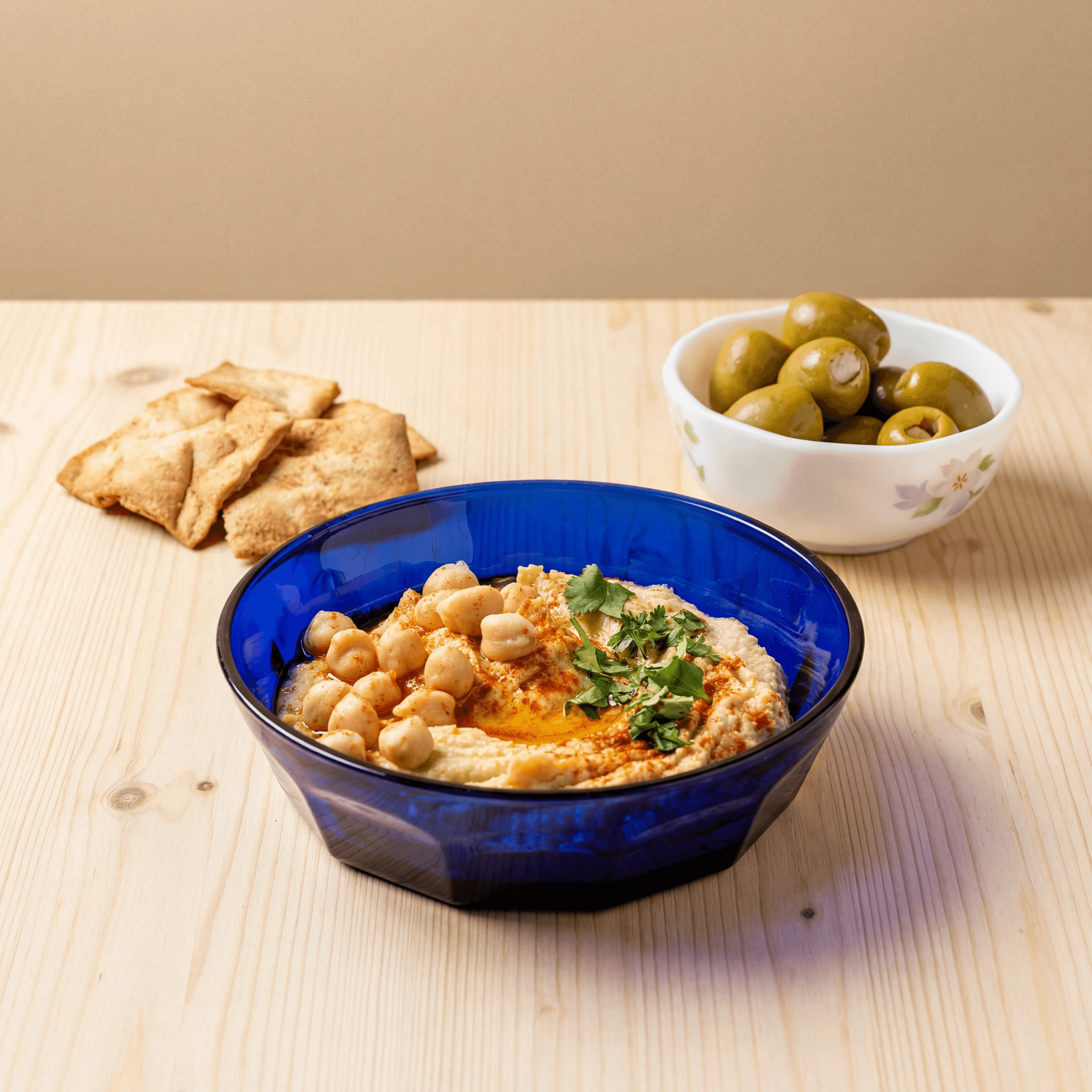 Premium Spanish EVOO with crusty bread and olive branch — olive oil brand marketplace product listing