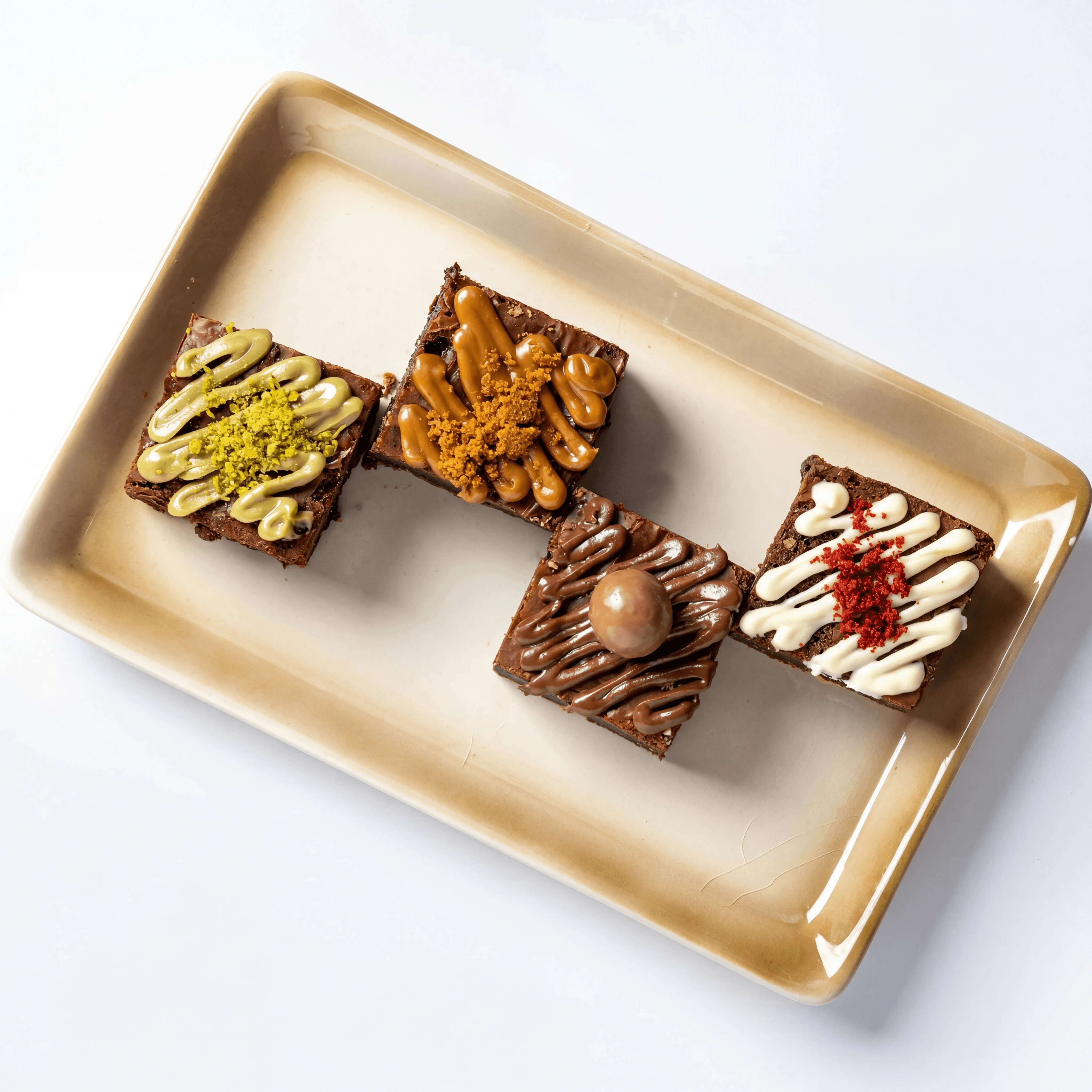 Artisan dark chocolate bar with freeze-dried berry inclusions — premium confection product photography