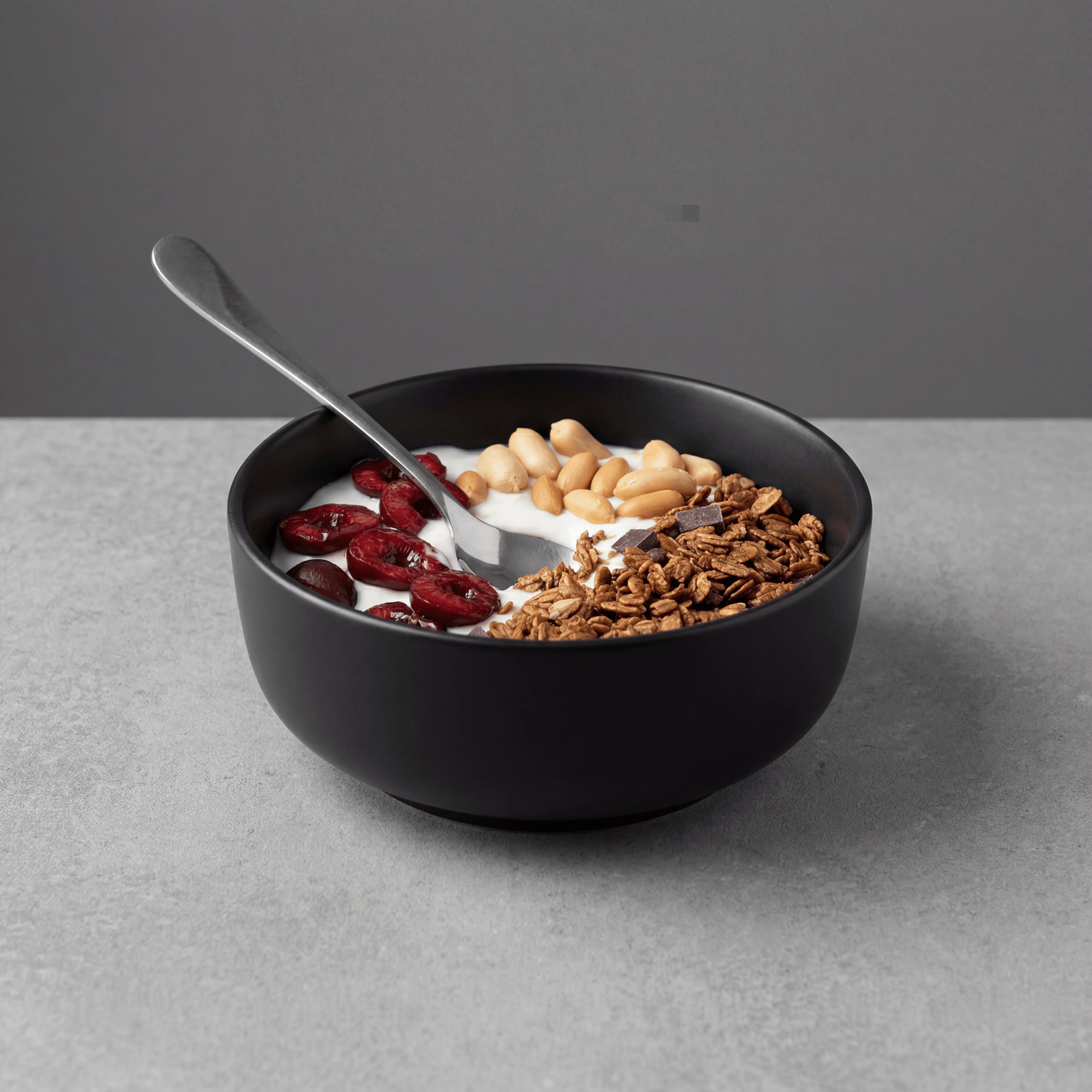 Honey almond granola bowl with Greek yogurt and fresh berries — breakfast brand e-commerce product shot