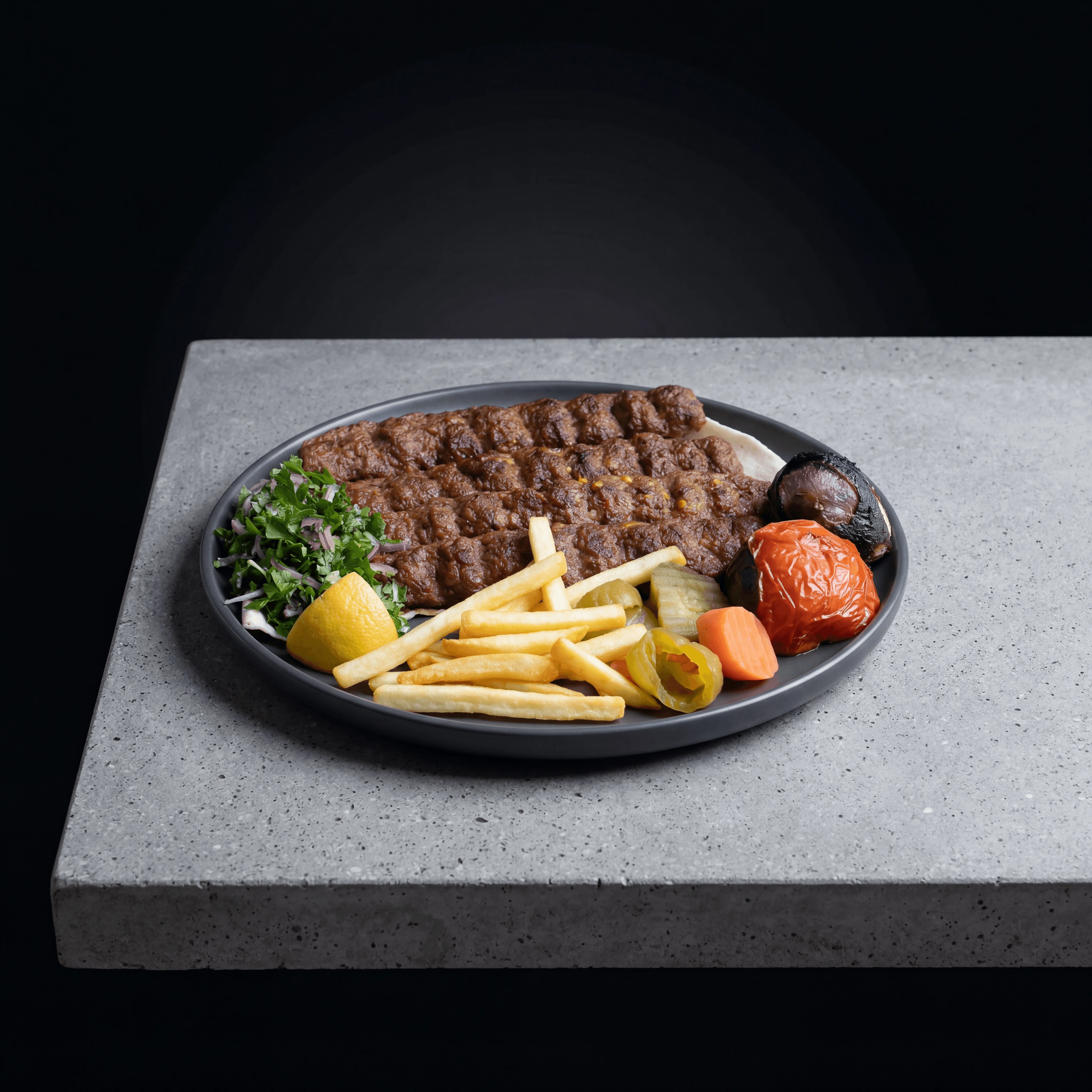 Spiced lamb kofta with herbed couscous — consistent fast-casual menu photography