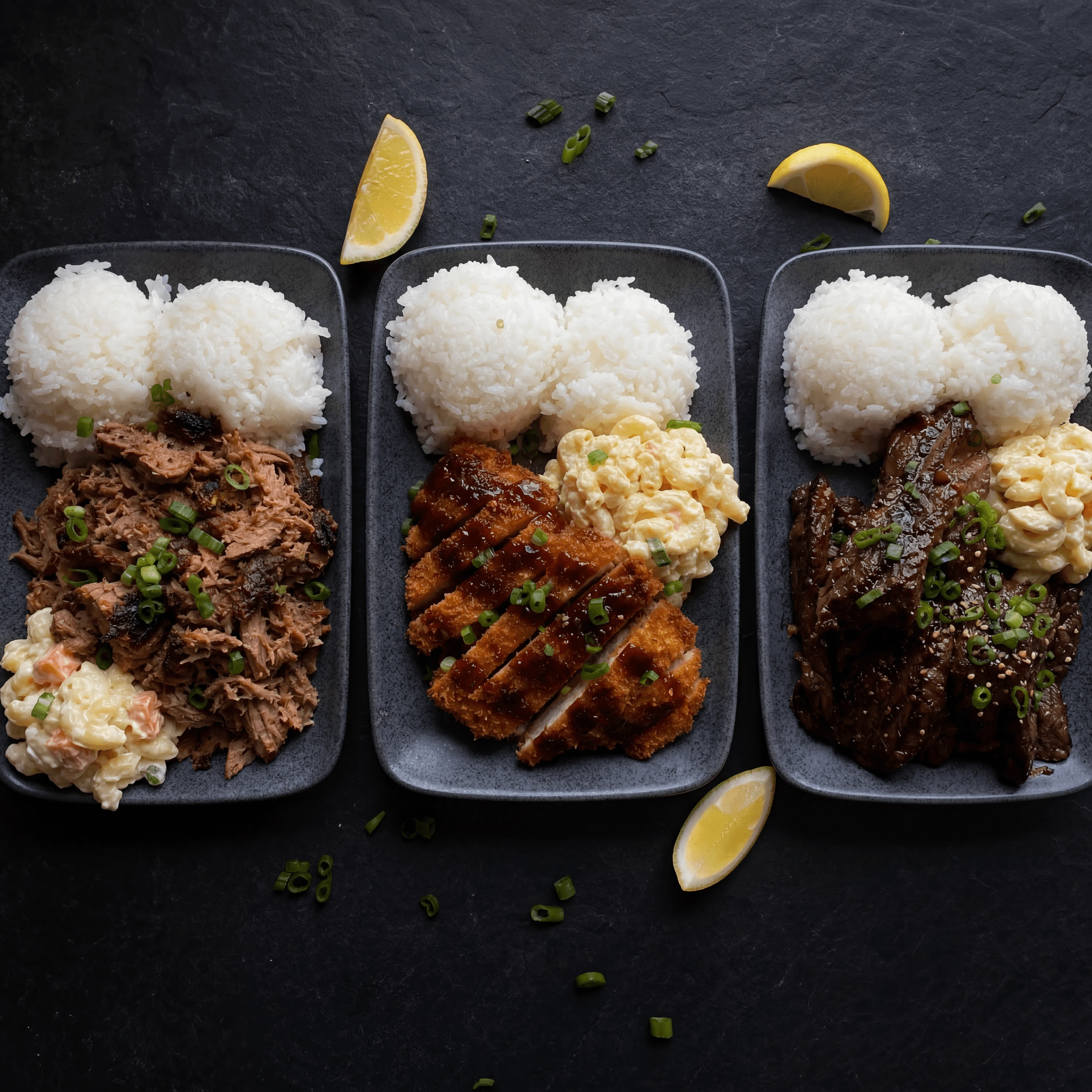 Three plate lunch combos kalua chicken katsu teriyaki dark monolith — plate lunch card photography