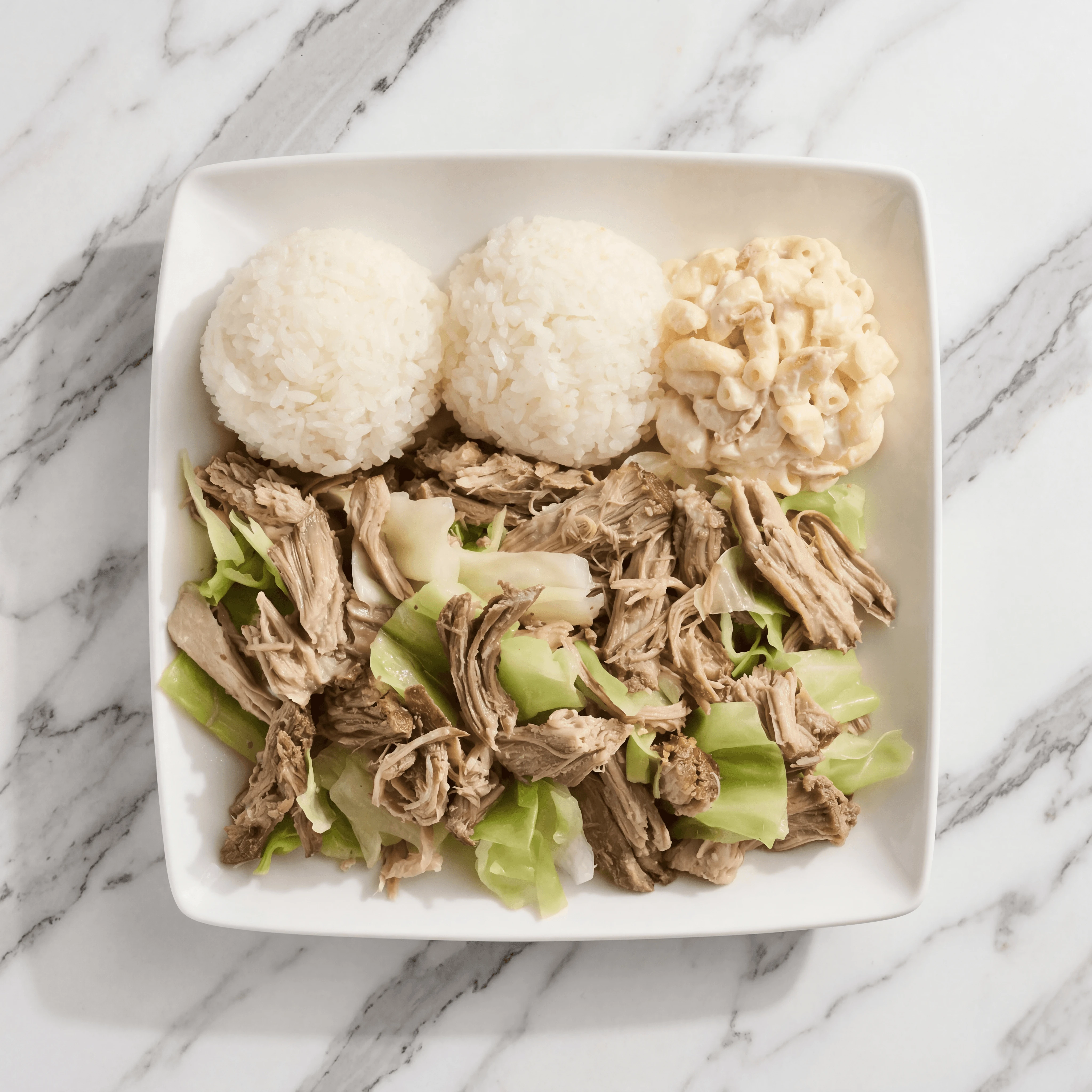 Single plate lunch kalua pork rice mac salad overhead macro marble — iconic plate lunch FAQ sidebar photography