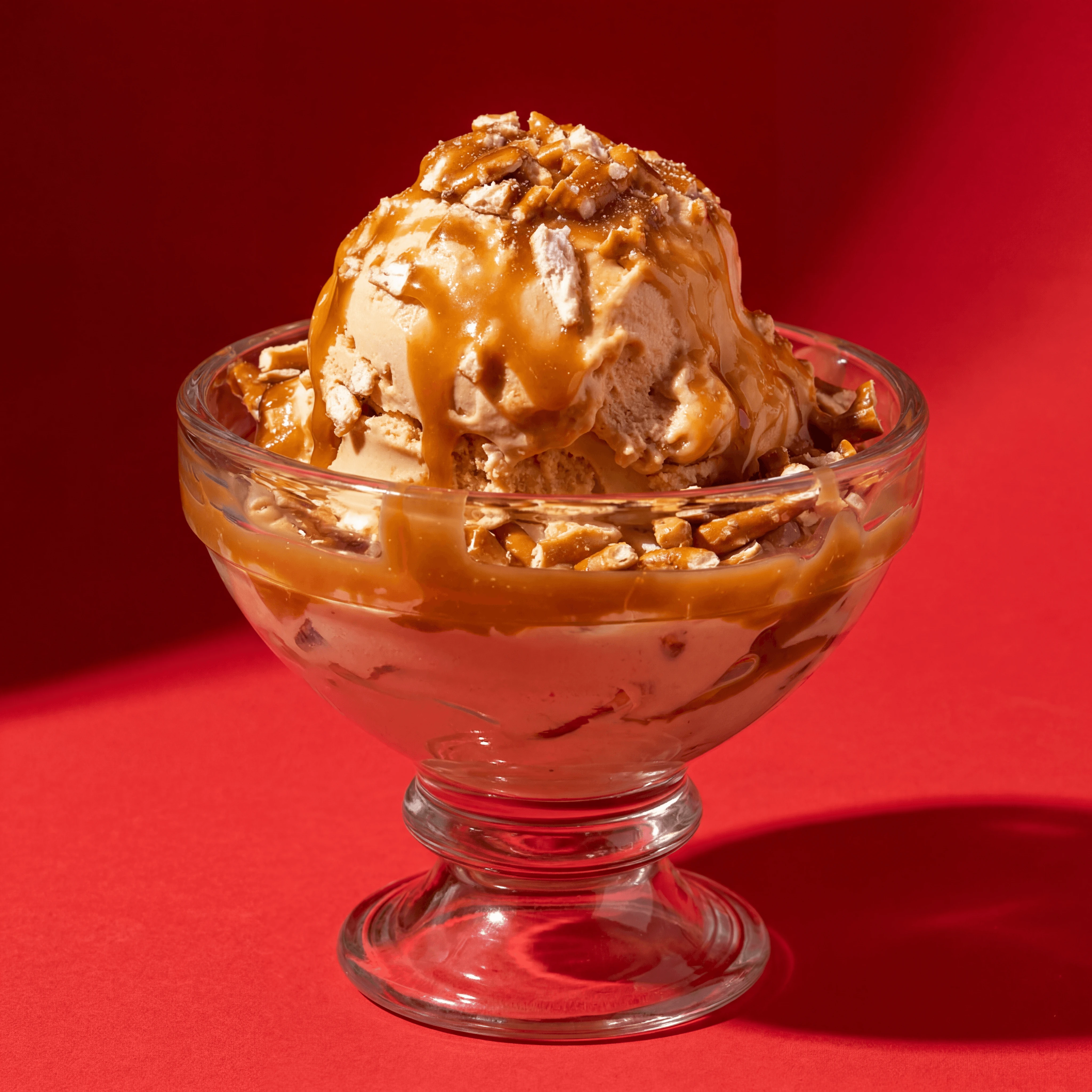 Caramel sundae with pretzel crunch and whipped cream — sundae topping cascade card photography