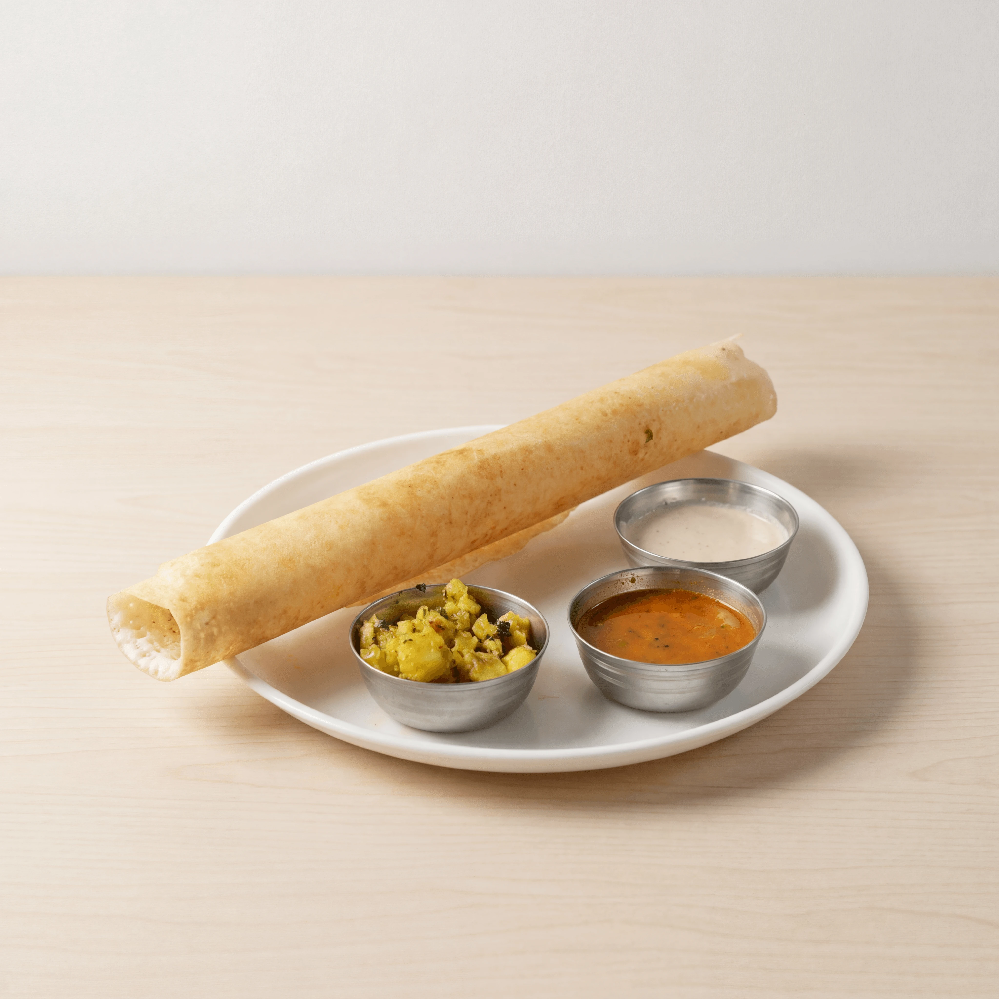 Masala dosa golden crispy roll sambar coconut chutney South Indian plate — dosa hero photography