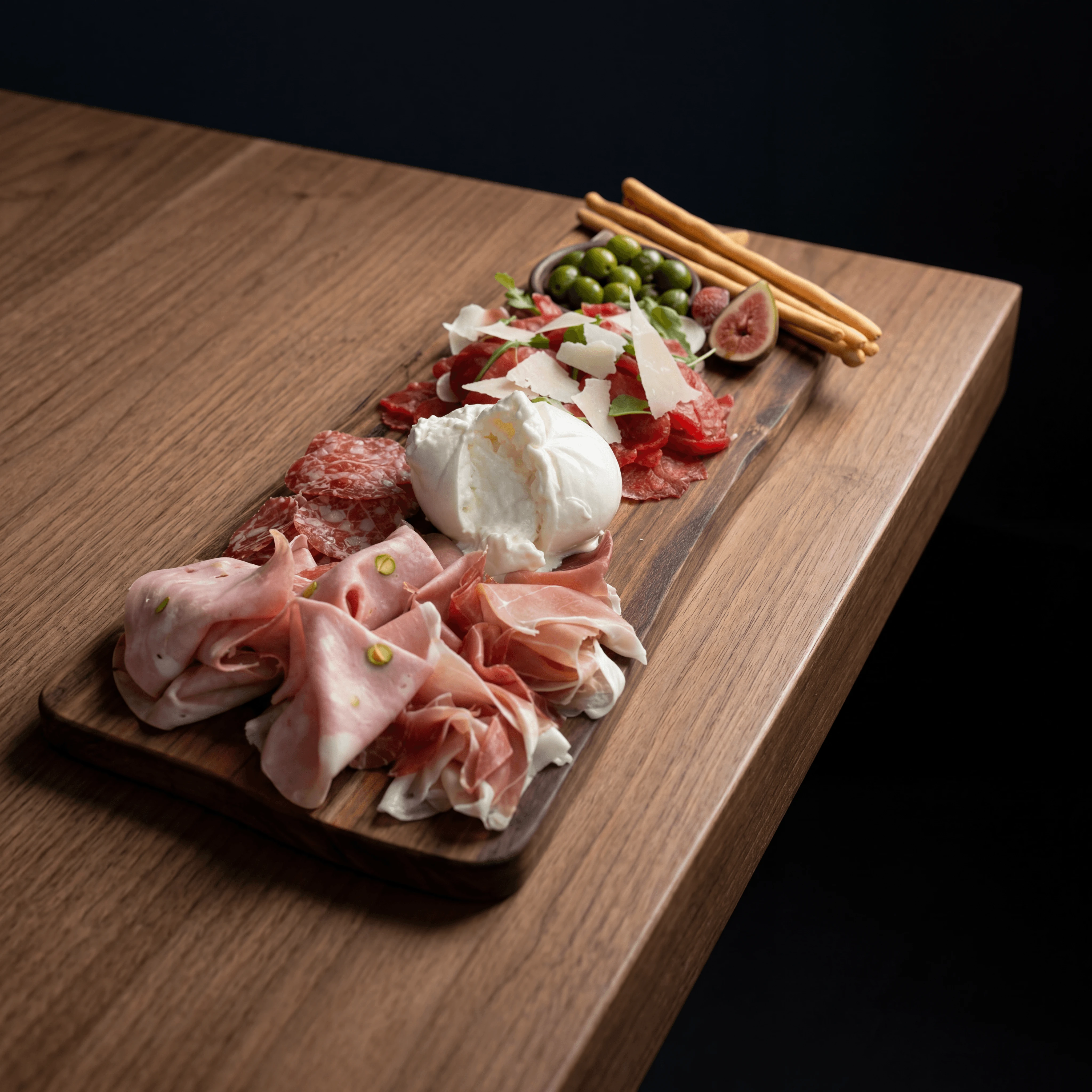 Salumi antipasti board prosciutto burrata carpaccio dark walnut enoteca — antipasti card photography