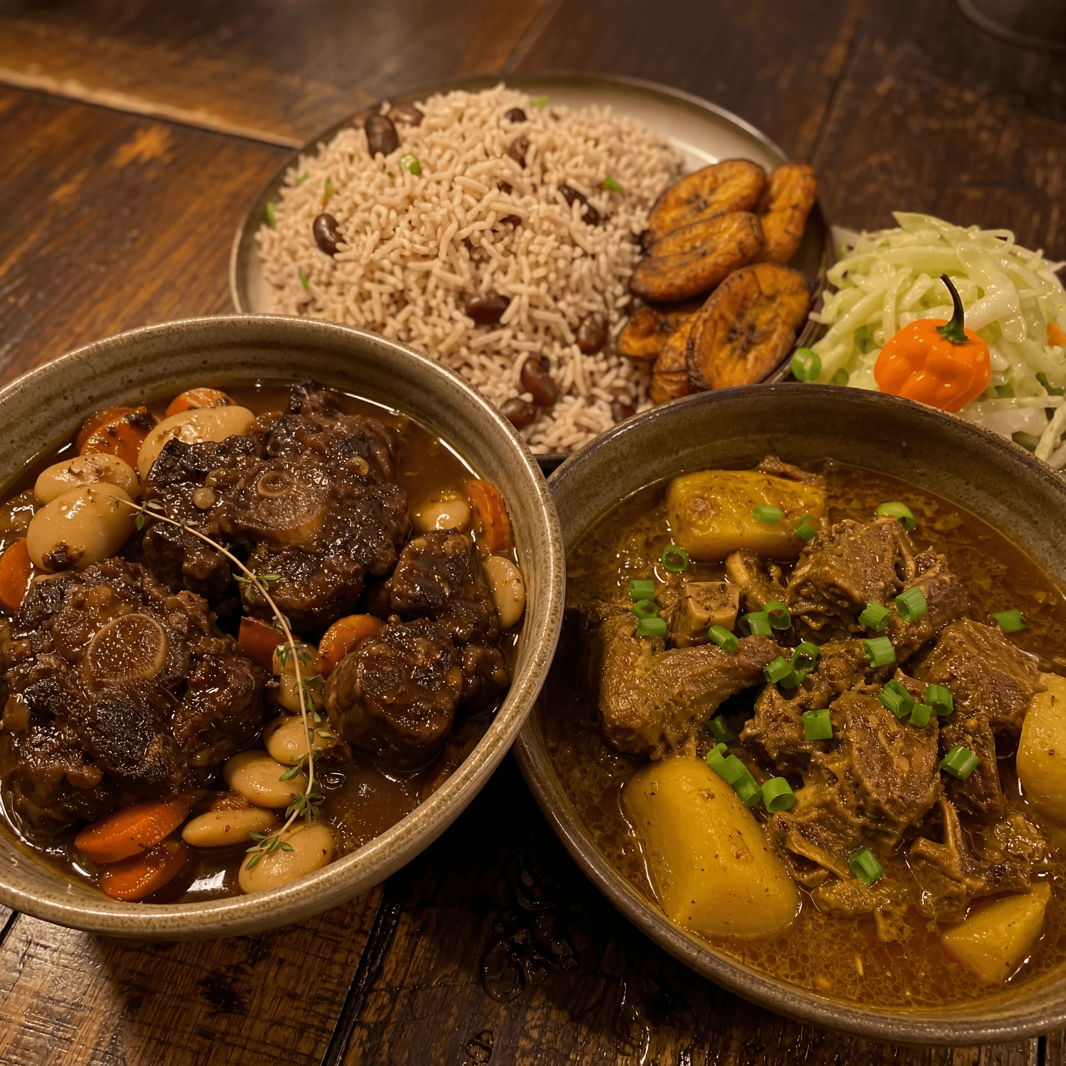 Oxtail curry goat braised bowls gravy gloss warm cantina jamaican — oxtail curry goat card photography