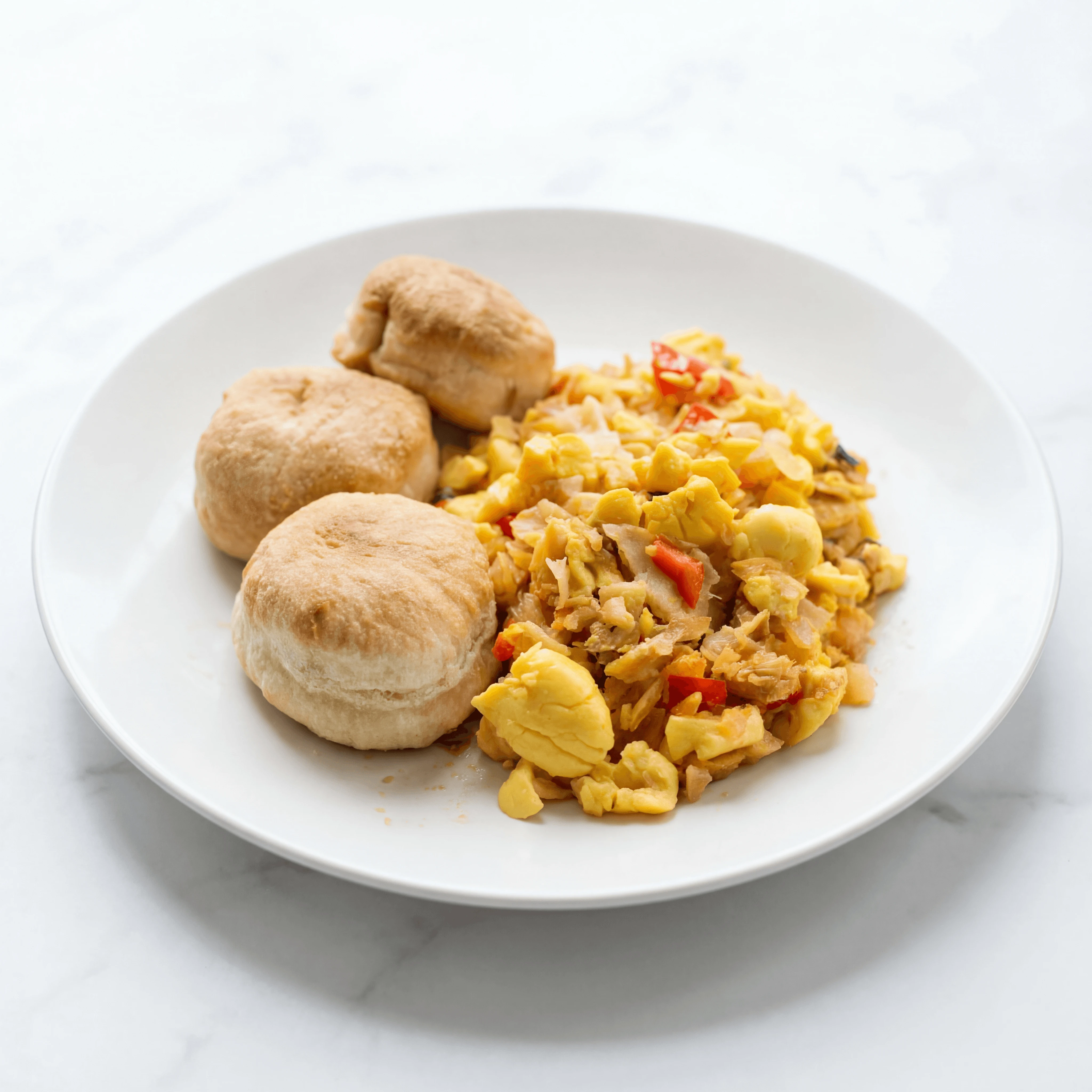 Ackee and saltfish yellow national dish plantain breakfast plate — ackee saltfish hero photography