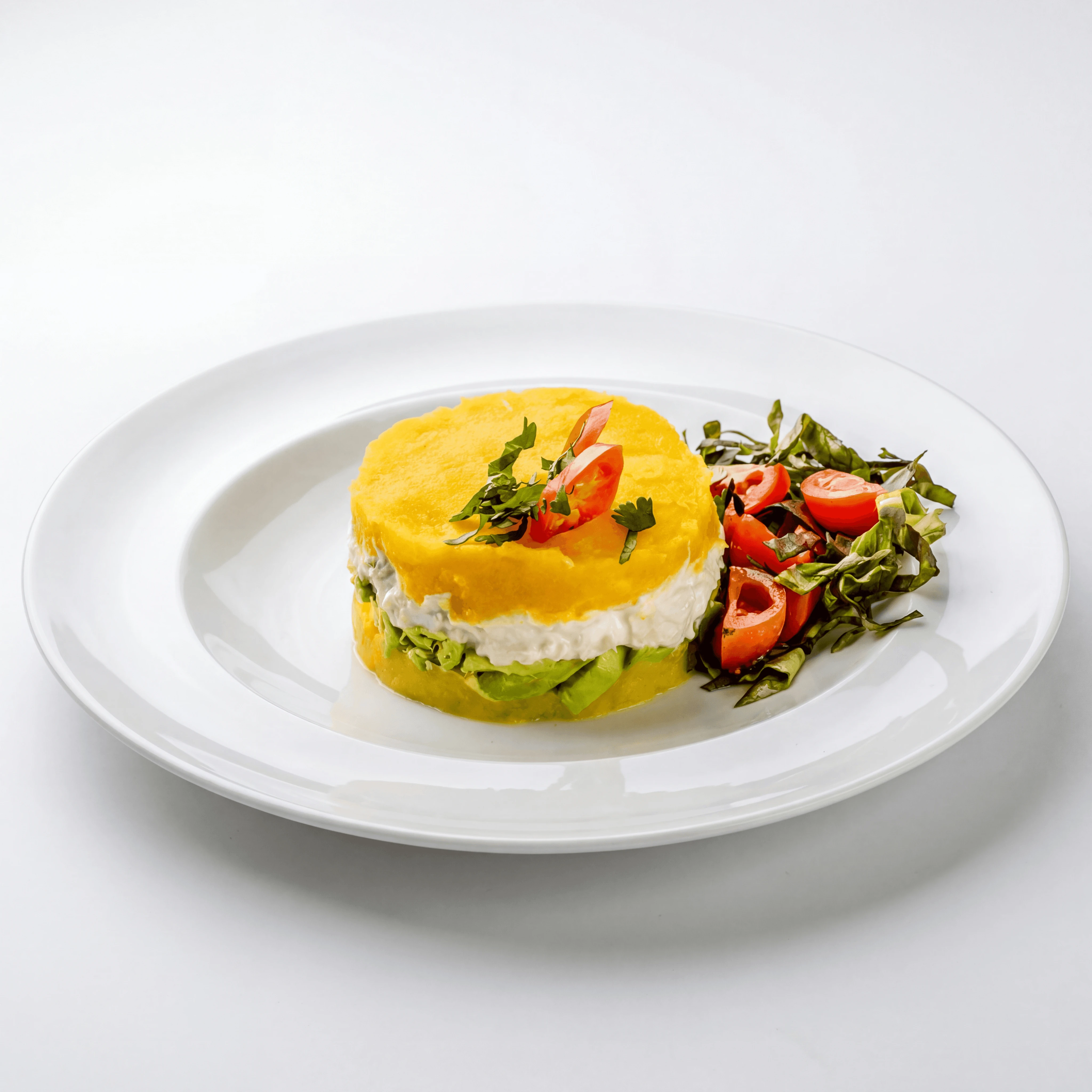 Causa rellena layered yellow potato avocado chicken pure shot — causa Peruvian hero photography