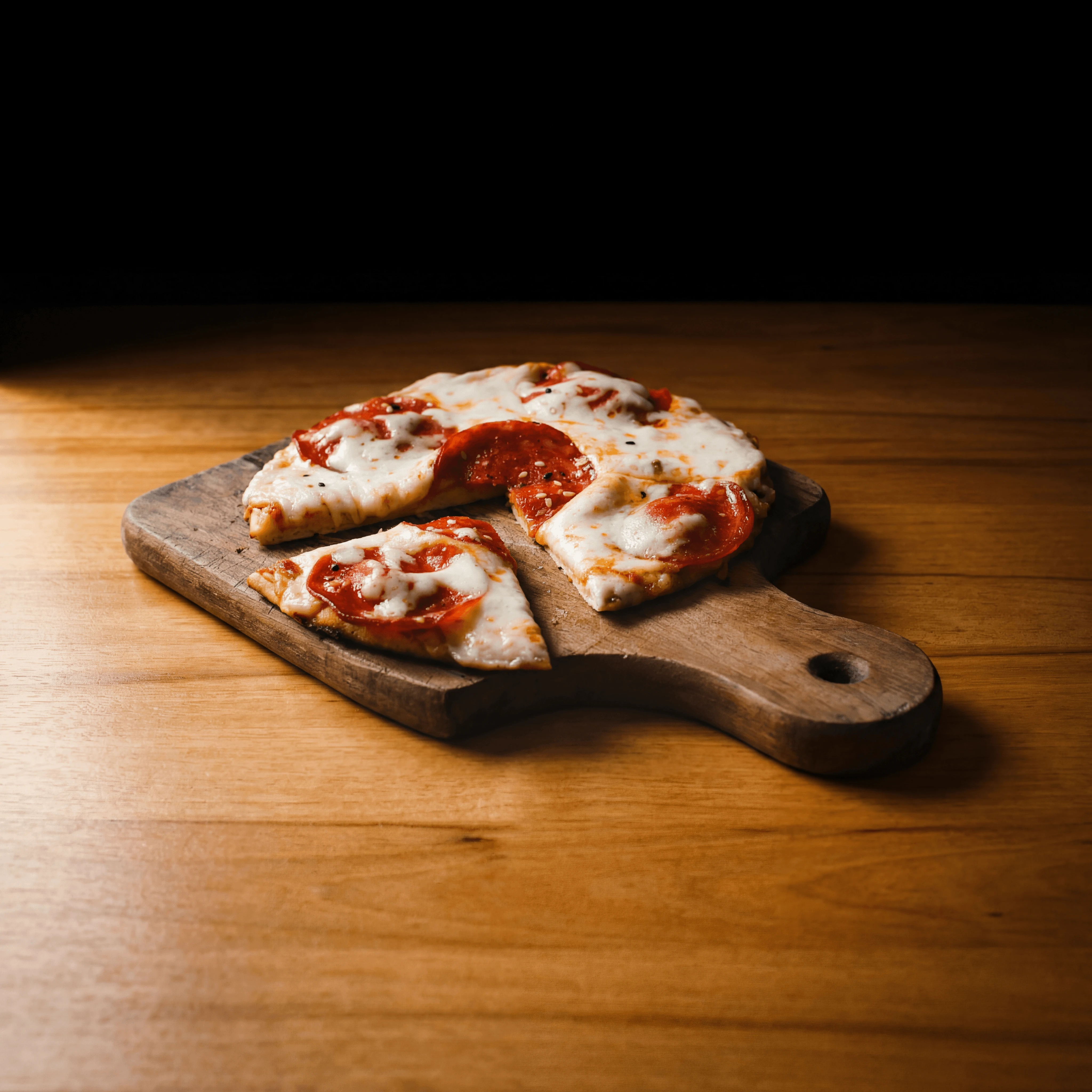 New York pizza slice with dramatic mozzarella cheese pull and vodka sauce — pizza slice photography
