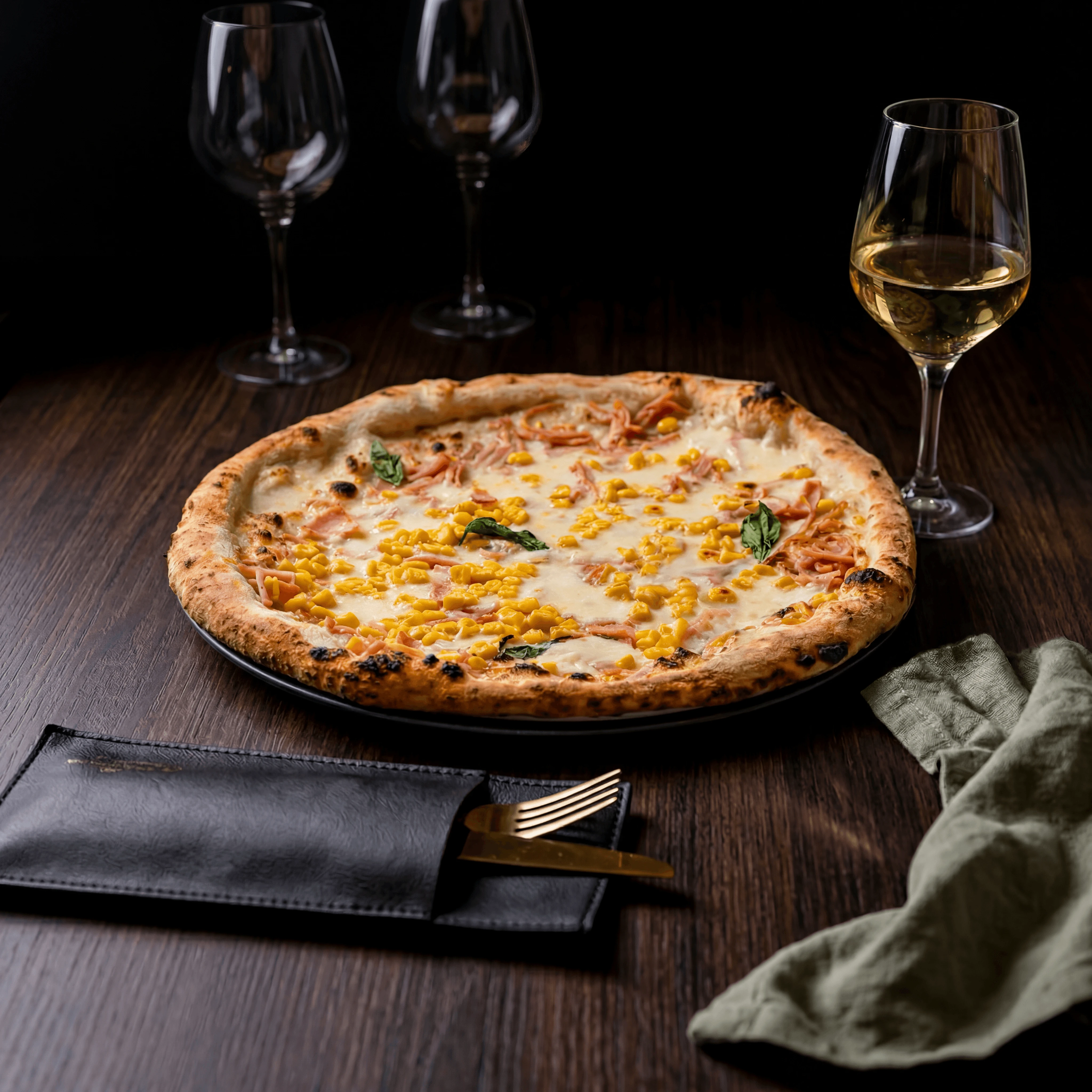 Japanese artisan white pizza with runny egg yolk and house sausage — Tokyo pizzeria photography