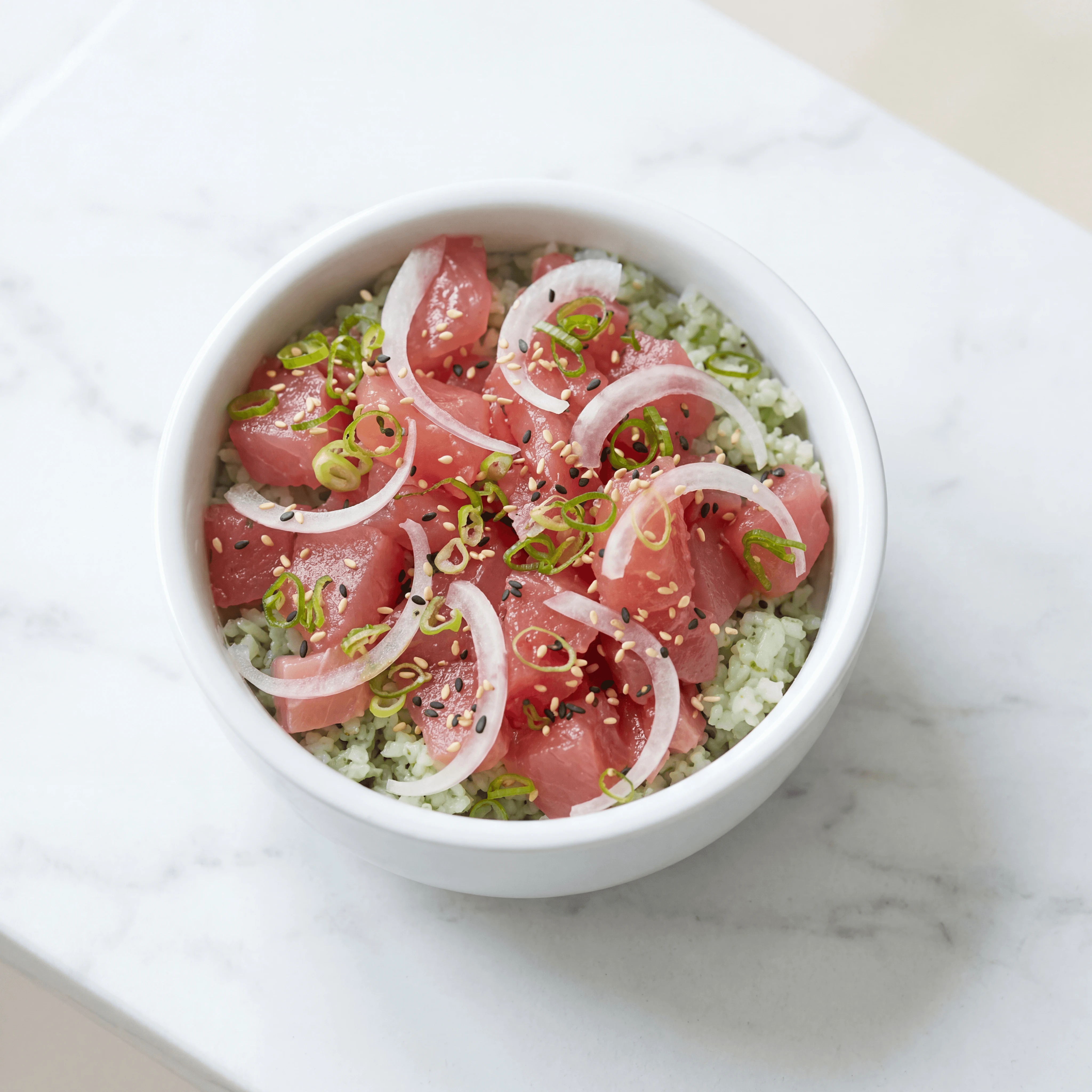 Single salmon poke bowl overhead avocado cucumber mango — salmon poke bowl hero photography